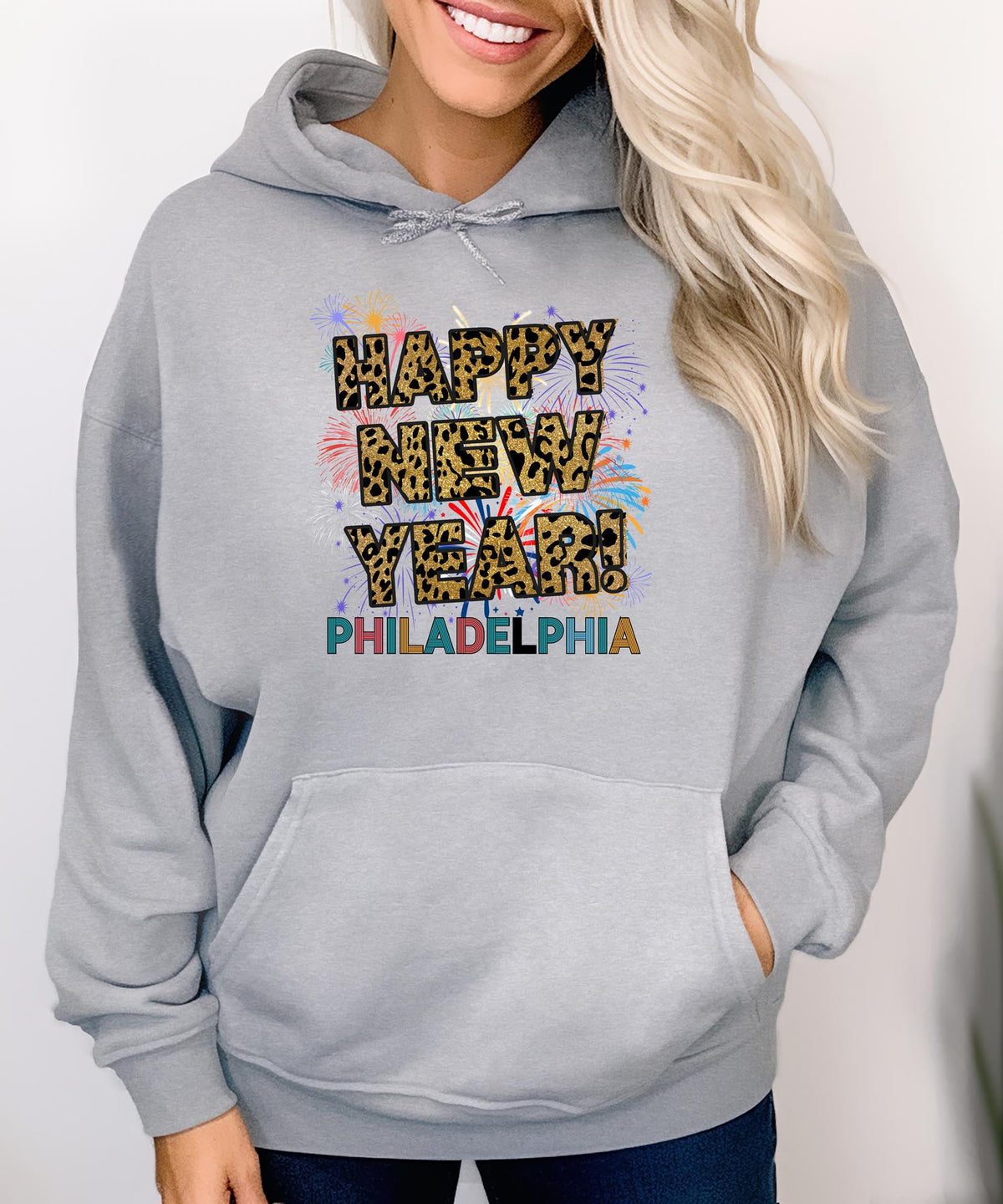 Unisex Happy New Year Philadelphia Hoodie – Fireworks, Leopard Print, and Festive Philly Style