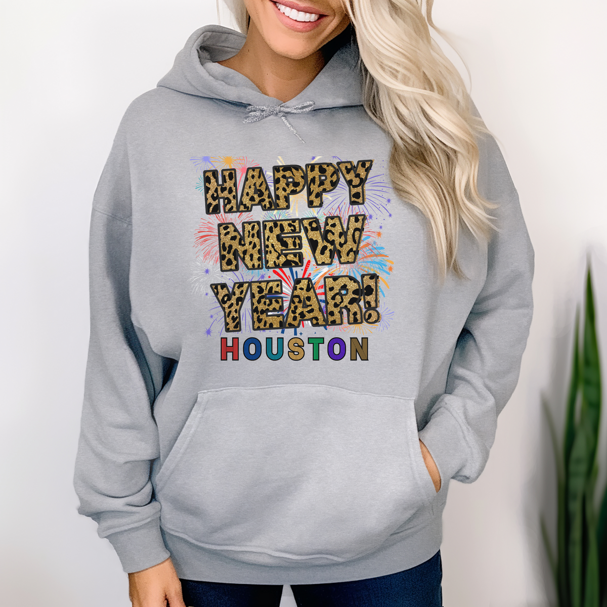 Unisex Happy New Year Houston Hoodie – Fireworks, Leopard Print, and Festive Texas Style